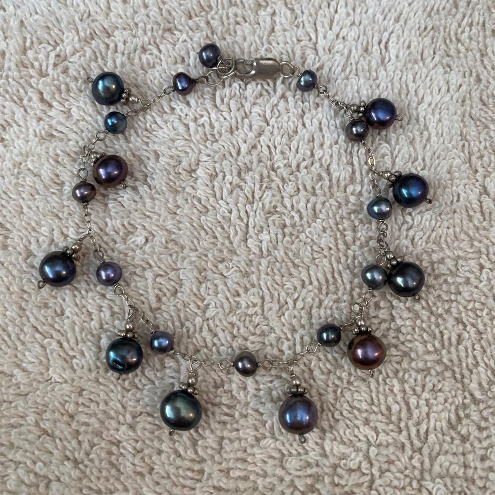 Sterling silver chain link bracelet featuring Tahitian or dark freshwater pearls